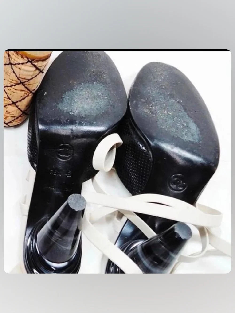 CHANEL Two-Tone Cream and Black Perforated Slingback Mules